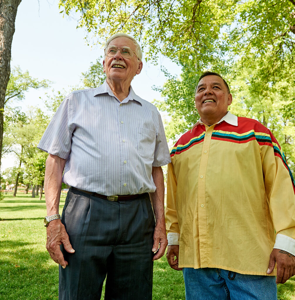 Circles for Reconciliation founders, Dr. Raymond Currie and Clayton Sandy standing in a park.
